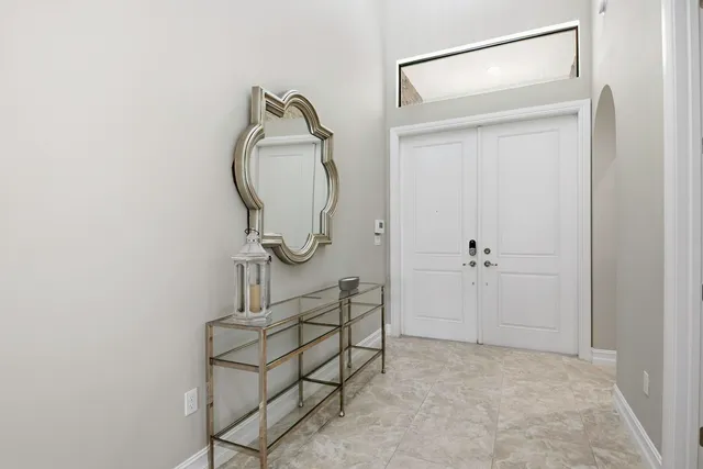 a kitchen with stainless steel appliances a sink stove and refrigerator