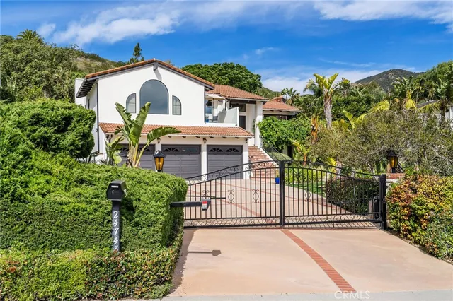 a kitchen with stainless steel appliances a refrigerator sink and stove