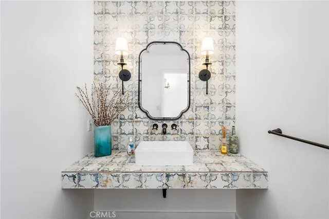 a view of hallway with stairs and wooden floor