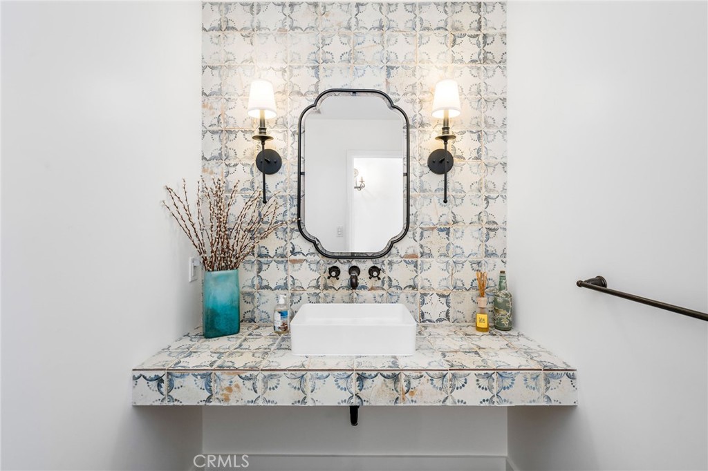 24743 Vantage Point Terrace Malibu, CA 90265 - Photo 23 of 64 a bathroom with a sink mirror and vanity