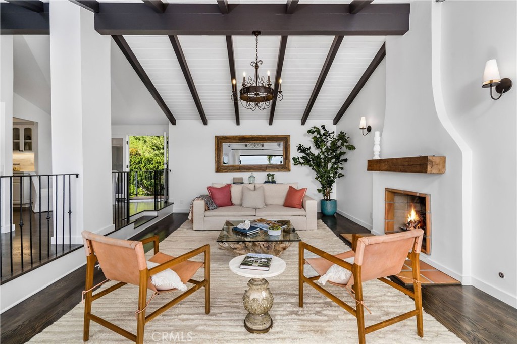 24743 Vantage Point Terrace Malibu, CA 90265 - Photo 24 of 64 a living room with furniture and a fireplace