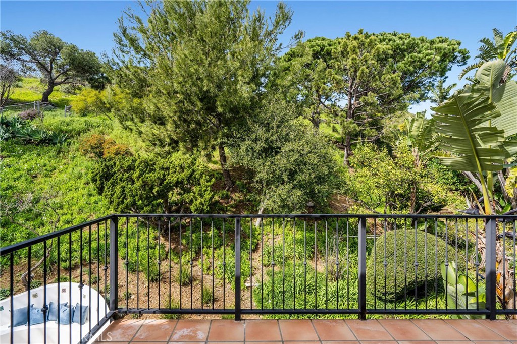 24743 Vantage Point Terrace Malibu, CA 90265 - Photo 27 of 64 a balcony with a lake view