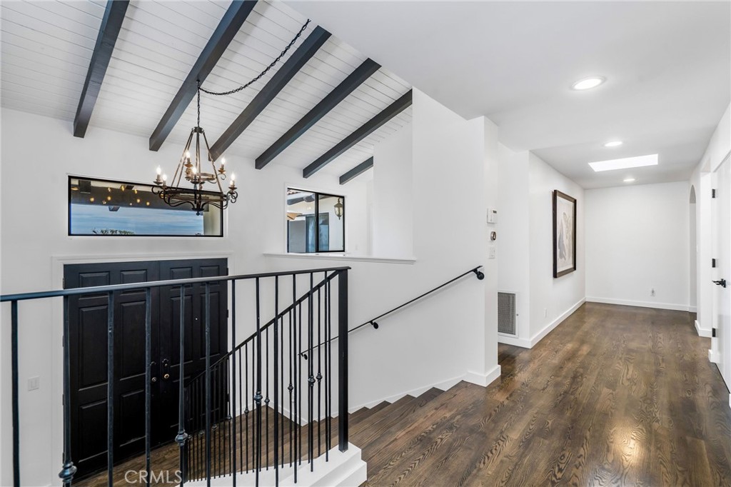 24743 Vantage Point Terrace Malibu, CA 90265 - Photo 29 of 64 a view of hallway with stairs and wooden floor