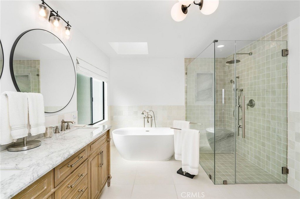 24743 Vantage Point Terrace Malibu, CA 90265 - Photo 37 of 64 a bathroom with a sink double vanity and a mirror