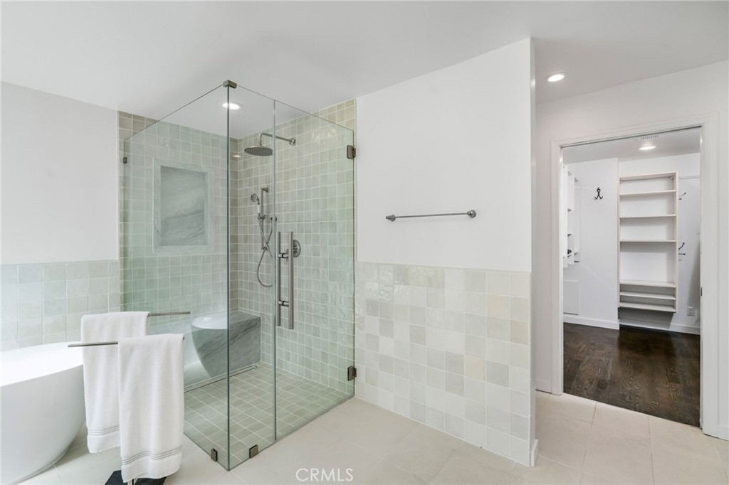 24743 Vantage Point Terrace Malibu, CA 90265 - Photo 39 of 64 a bathroom with a shower and a tub