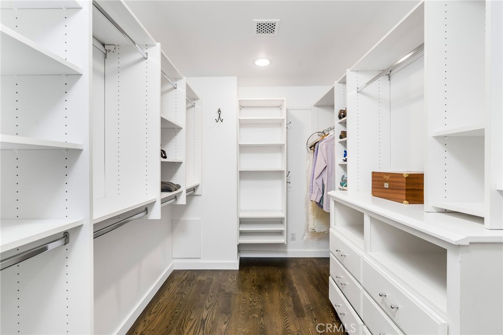 24743 Vantage Point Terrace Malibu, CA 90265 - Photo 40 of 64 a view of walk in closet with empty racks
