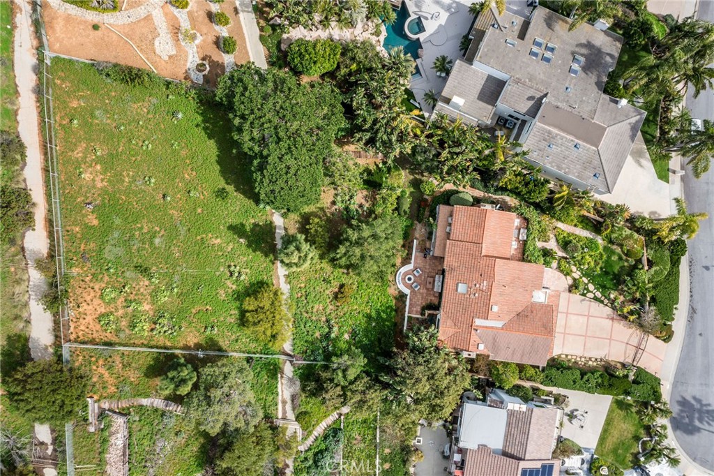 24743 Vantage Point Terrace Malibu, CA 90265 - Photo 4 of 64 an aerial view of a house with a yard