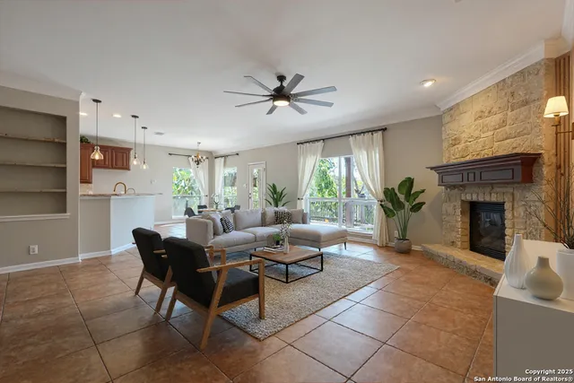 a view of a big room with closet and a chandelier