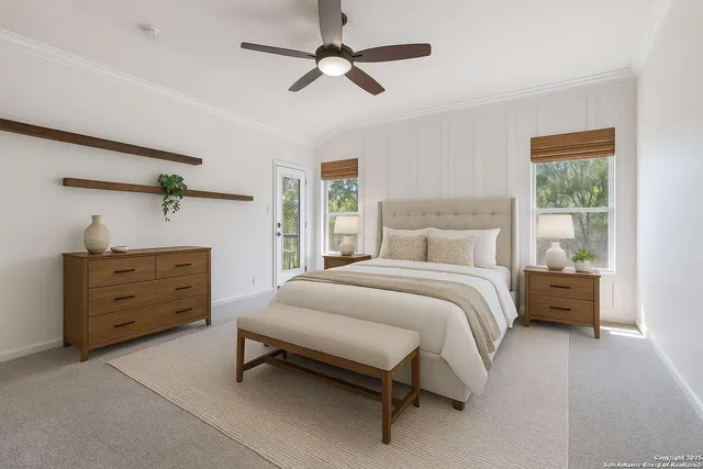 a large bed sitting in a bedroom next to a window