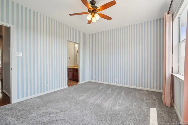 an aerial view of a house with a garden