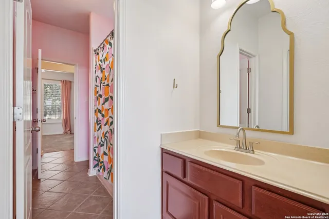 a front view of house with a garden