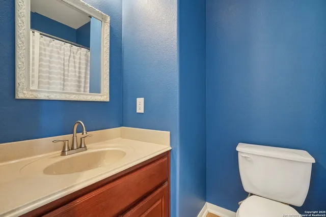 a view of a backyard with sitting area