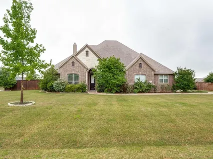 a house with trees in front of it