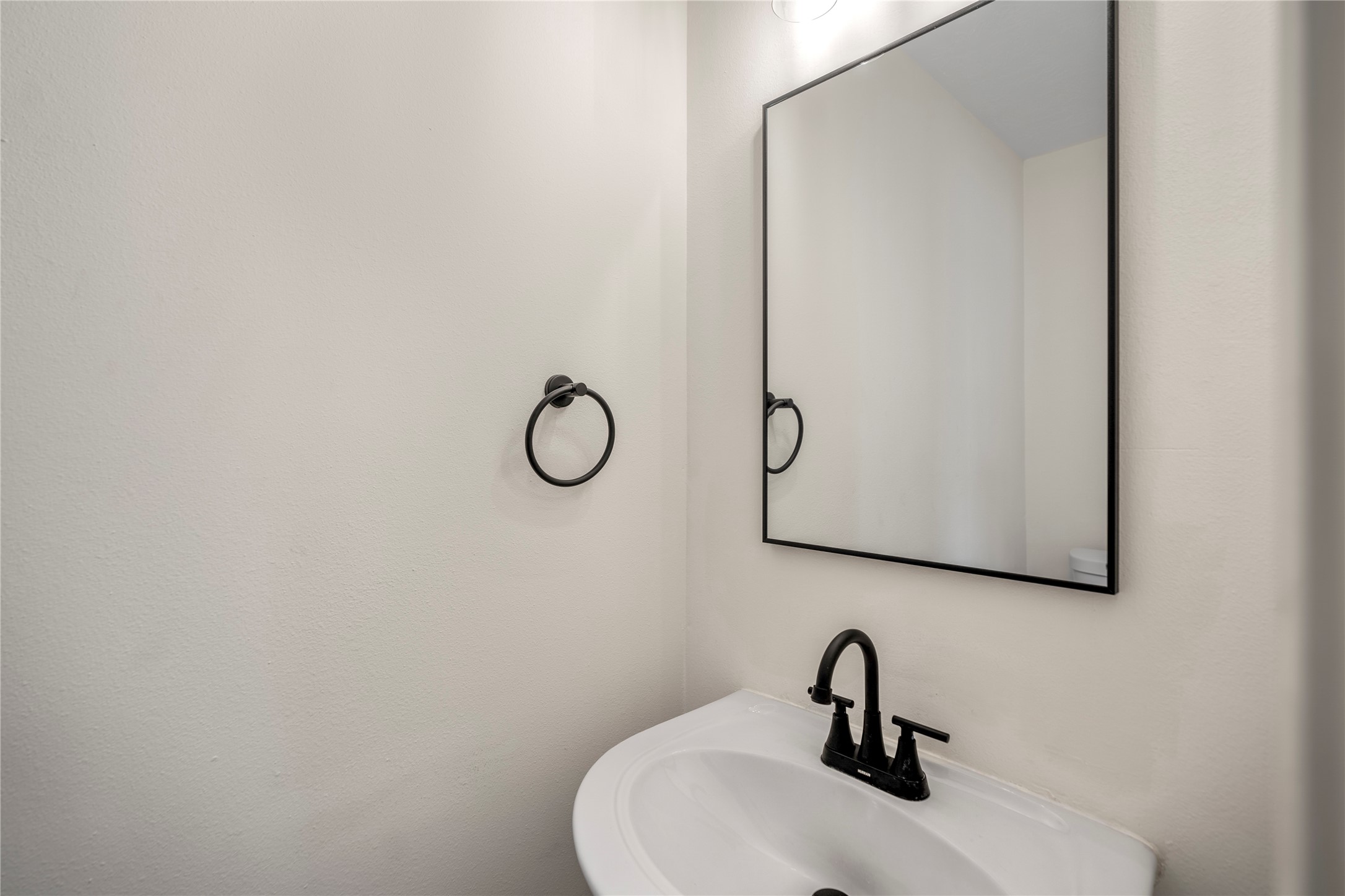11735 Alief Clodine Road, Unit 20 Houston, TX 77072 - Photo 15 of 33 a bathroom with a sink and mirror