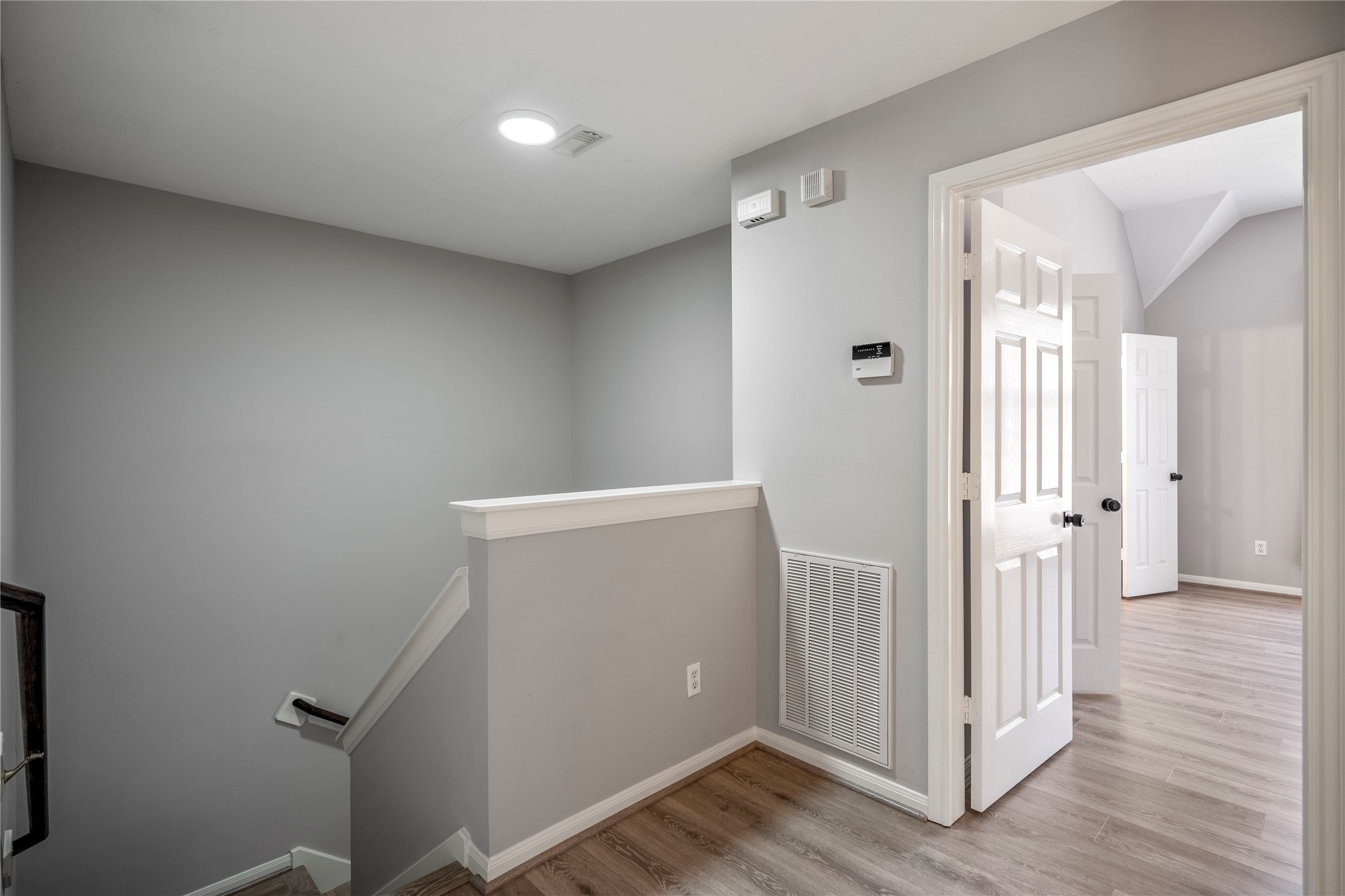 11735 Alief Clodine Road, Unit 20 Houston, TX 77072 - Photo 18 of 33 a view of a hallway with wooden floor and closet