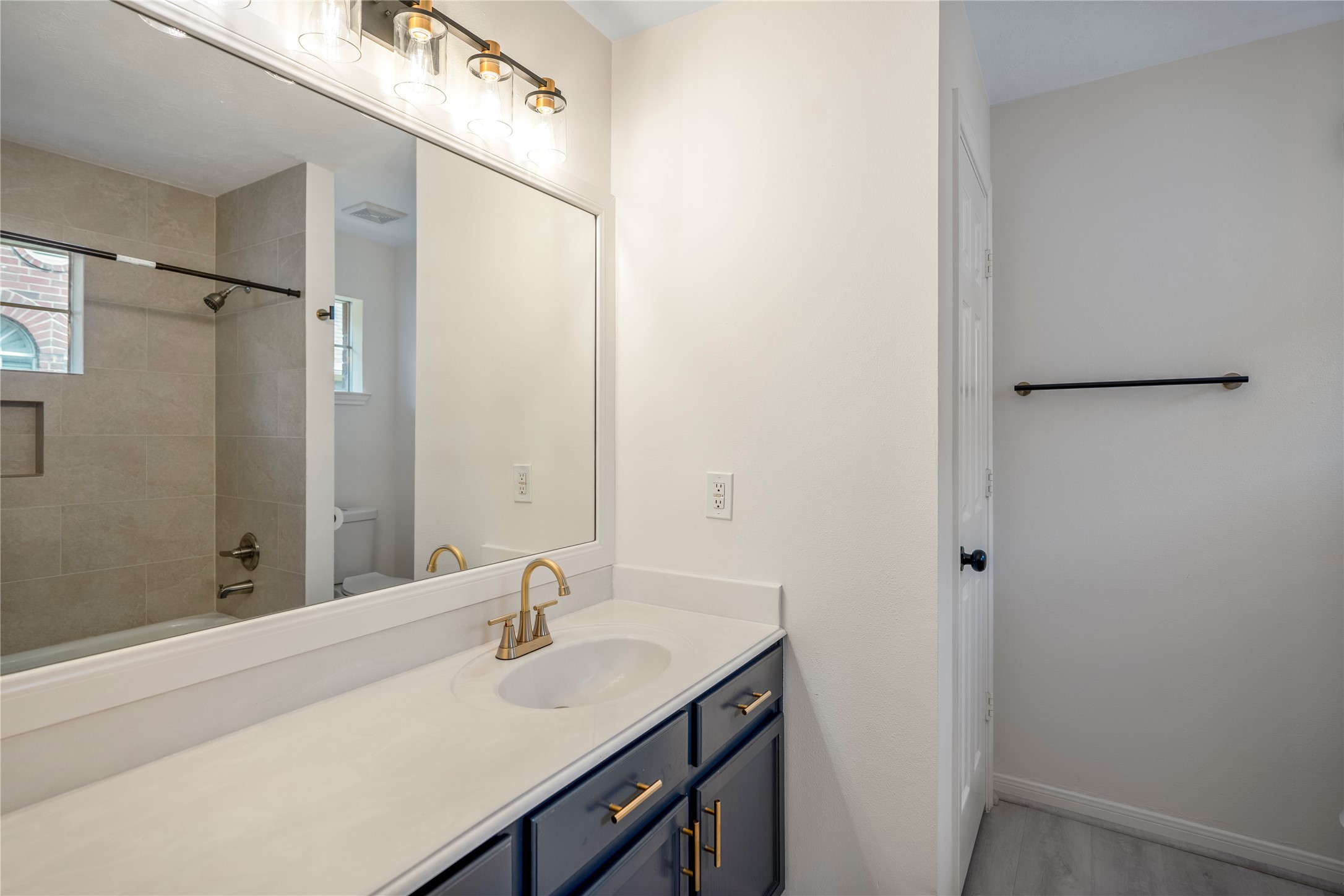11735 Alief Clodine Road, Unit 20 Houston, TX 77072 - Photo 21 of 33 a bathroom with a sink and a mirror