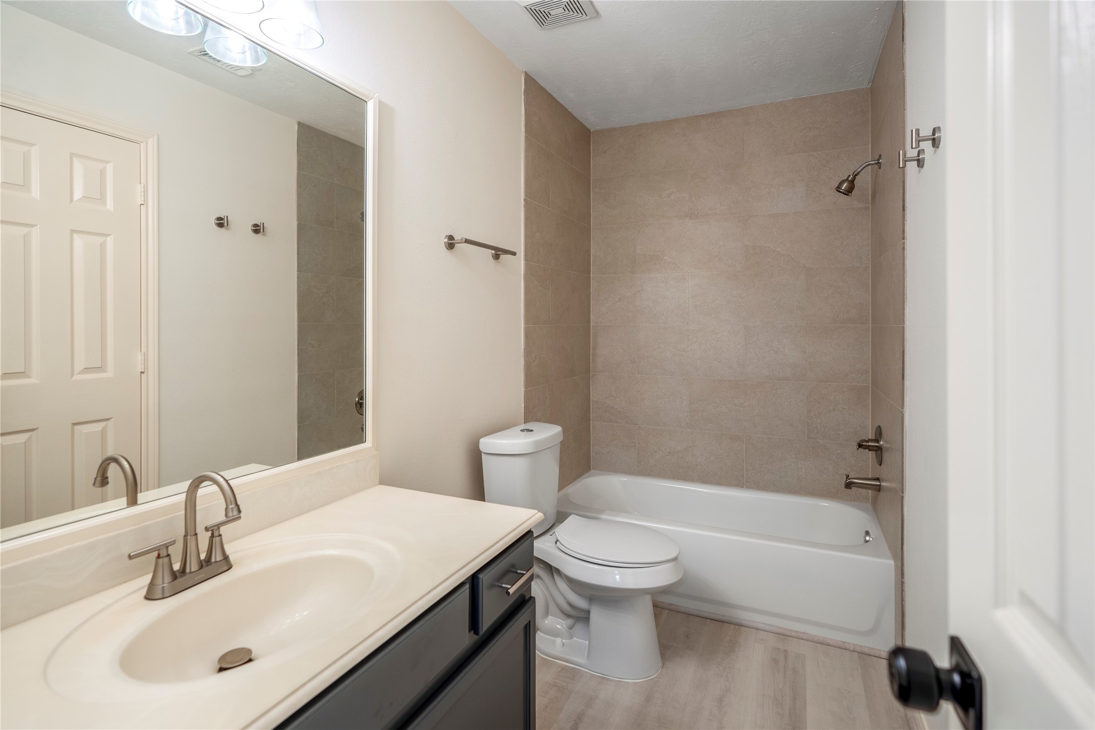 11735 Alief Clodine Road, Unit 20 Houston, TX 77072 - Photo 29 of 33 a bathroom with a sink toilet and shower