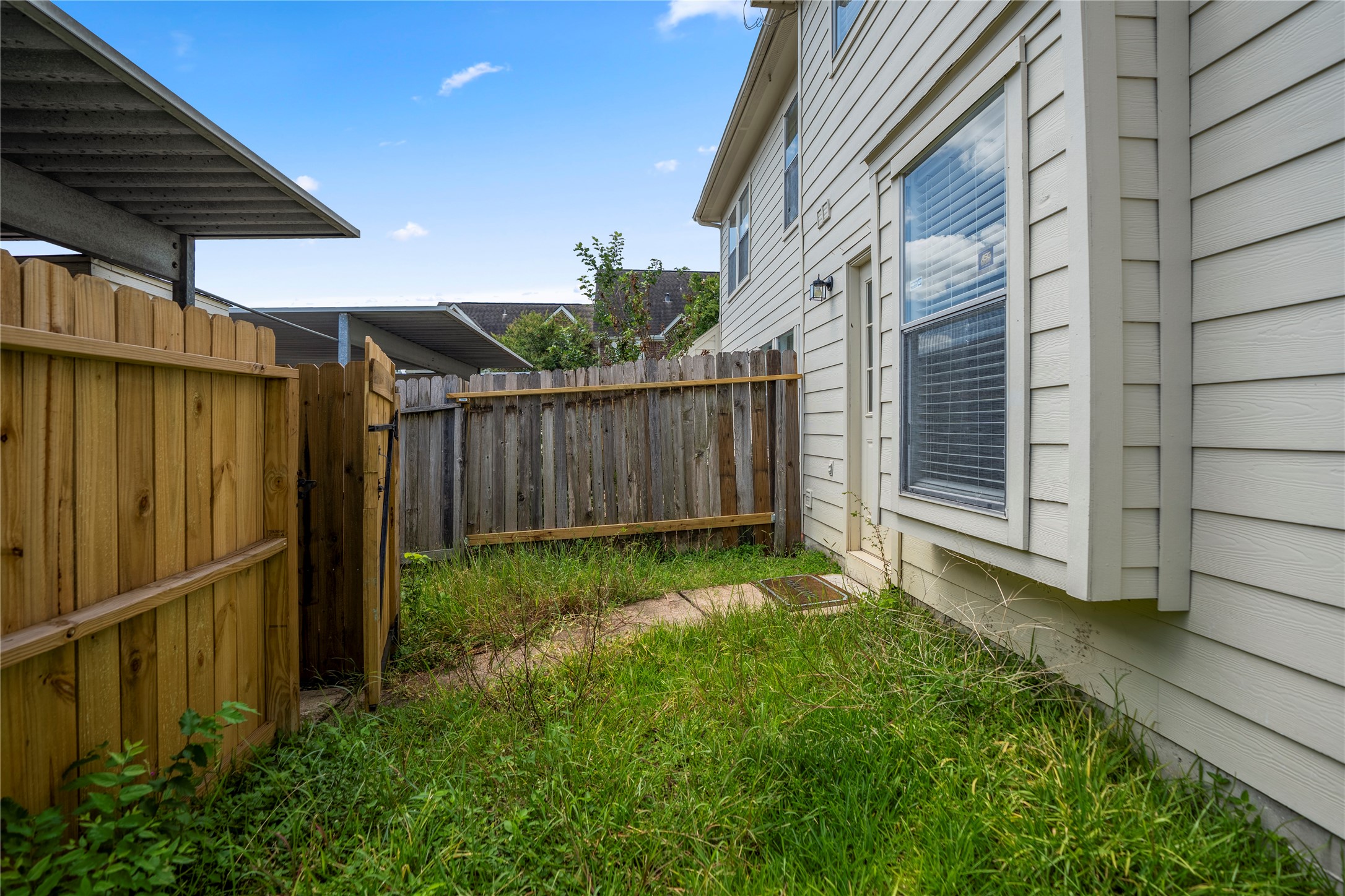 11735 Alief Clodine Road, Unit 20 Houston, TX 77072 - Photo 31 of 33 a view of backyard with tub and garden