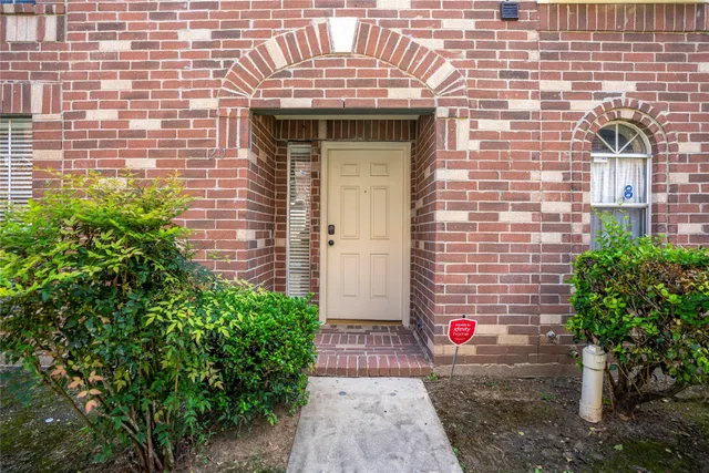 a front view of a house with a garage