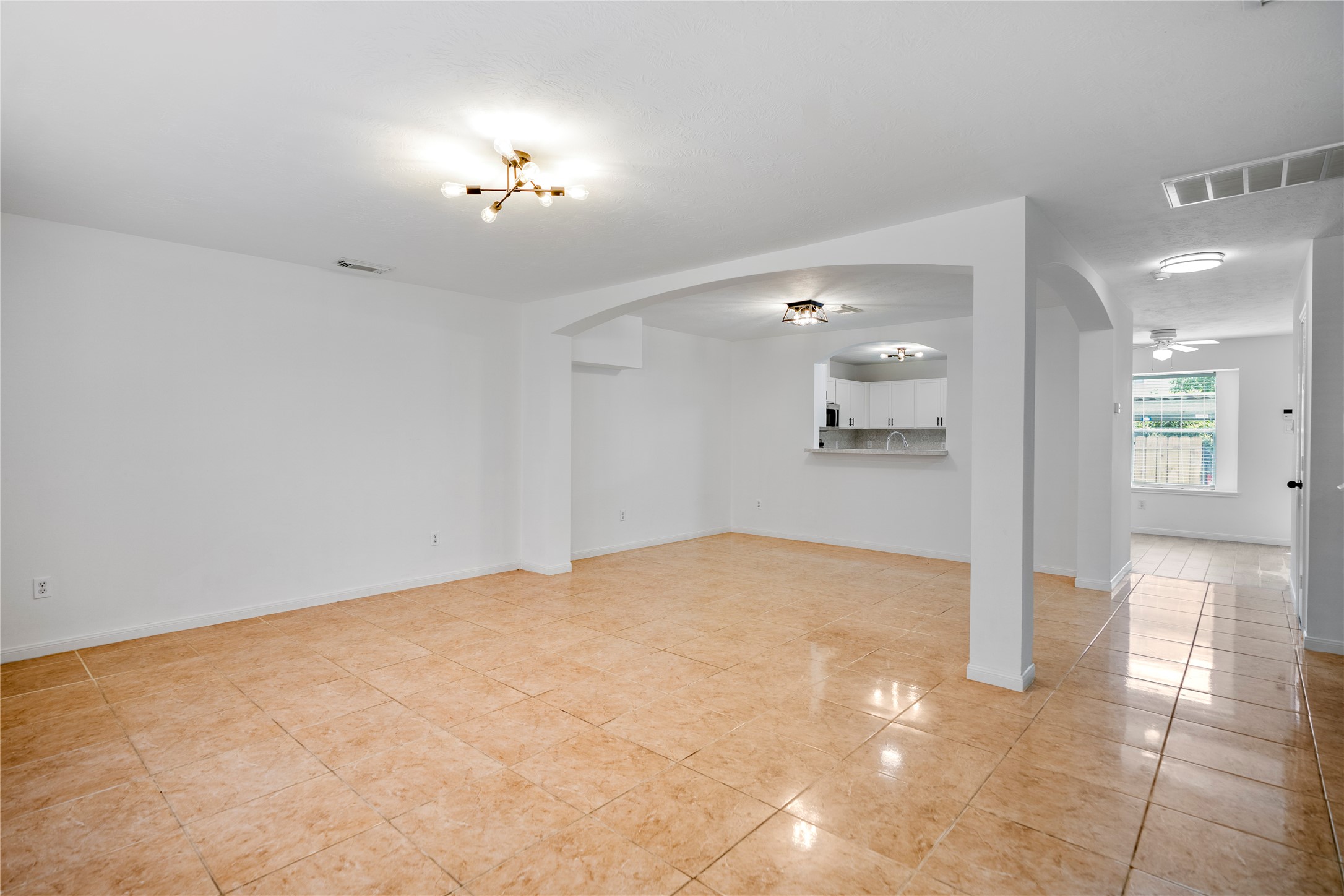 11735 Alief Clodine Road, Unit 20 Houston, TX 77072 - Photo 6 of 33 a view of a hallway with a chandelier