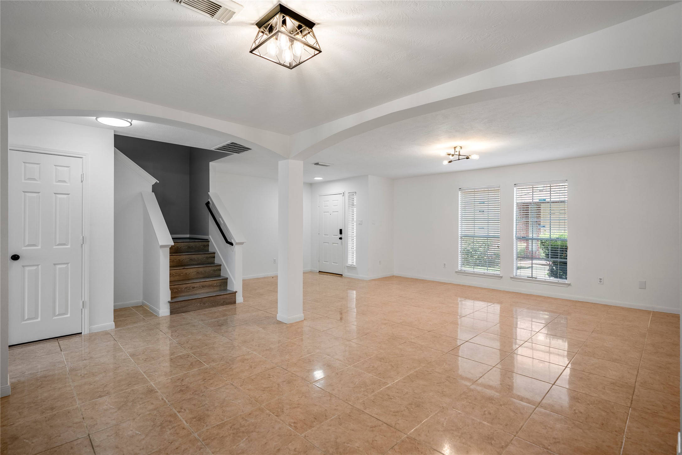 11735 Alief Clodine Road, Unit 20 Houston, TX 77072 - Photo 7 of 33 a view of an empty room with a window