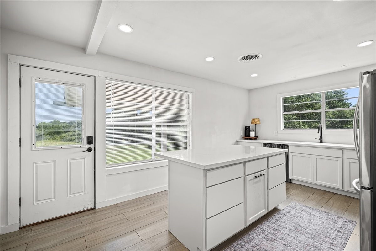 4228 Fm 390 Road West Burton, TX 77835 - Photo 11 of 25 and transition right into the kitchen