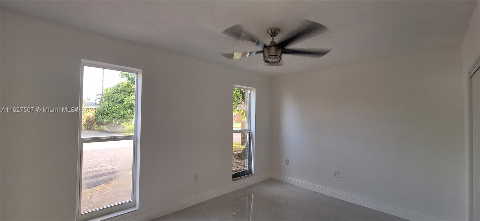 8620 Windsor Drive Miramar, FL 33025 - Photo 13 of 31 a view of an empty room and window