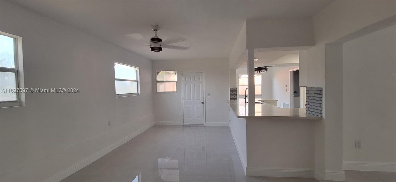 8620 Windsor Drive Miramar, FL 33025 - Photo 19 of 31 an empty room with windows and closet