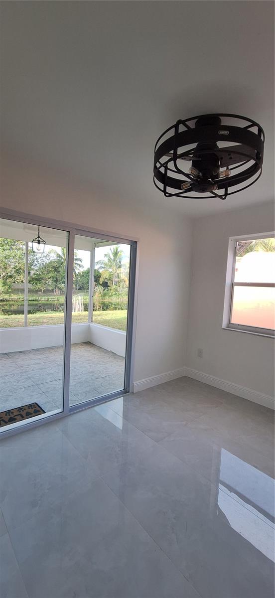 8620 Windsor Drive Miramar, FL 33025 - Photo 21 of 31 a view of an empty room with a window
