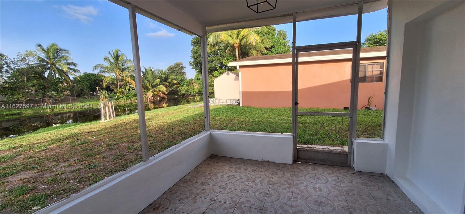8620 Windsor Drive Miramar, FL 33025 - Photo 24 of 31 a view of a back yard from a balcony