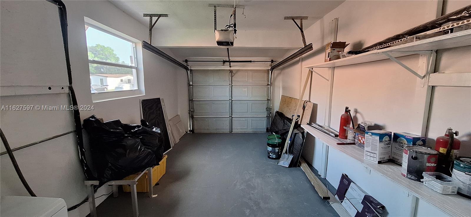 8620 Windsor Drive Miramar, FL 33025 - Photo 26 of 31 a view of a hallway with storage