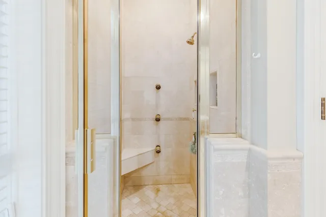 a view of a house with swimming pool and sitting area