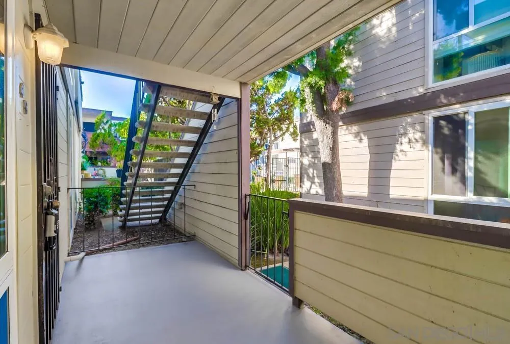 3333 Ruffin Road, Unit 4S San Diego, CA 92123 - Photo 29 of 34 a view of a porch with wooden floor and outdoor space