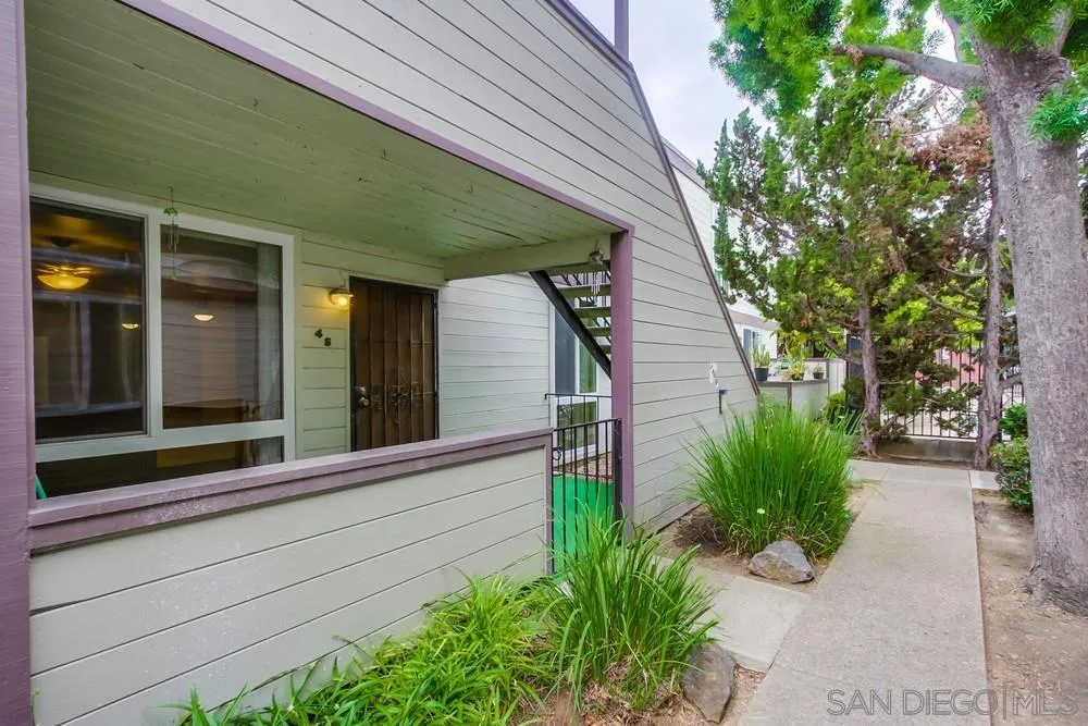 3333 Ruffin Road, Unit 4S San Diego, CA 92123 - Photo 30 of 34 a front view of a house with garden