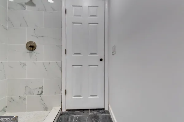 a bathroom with a bathtub