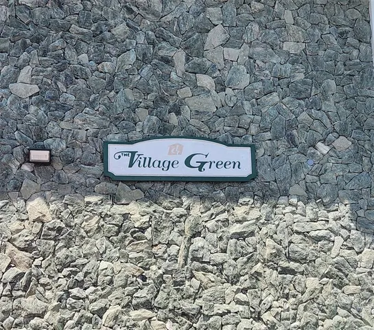 a sign on the side of a road