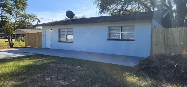 a backyard of a house with seating space