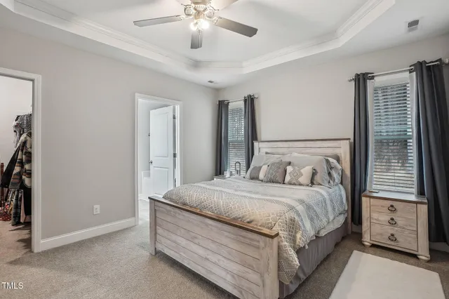 a view of a walk in closet and bathroom