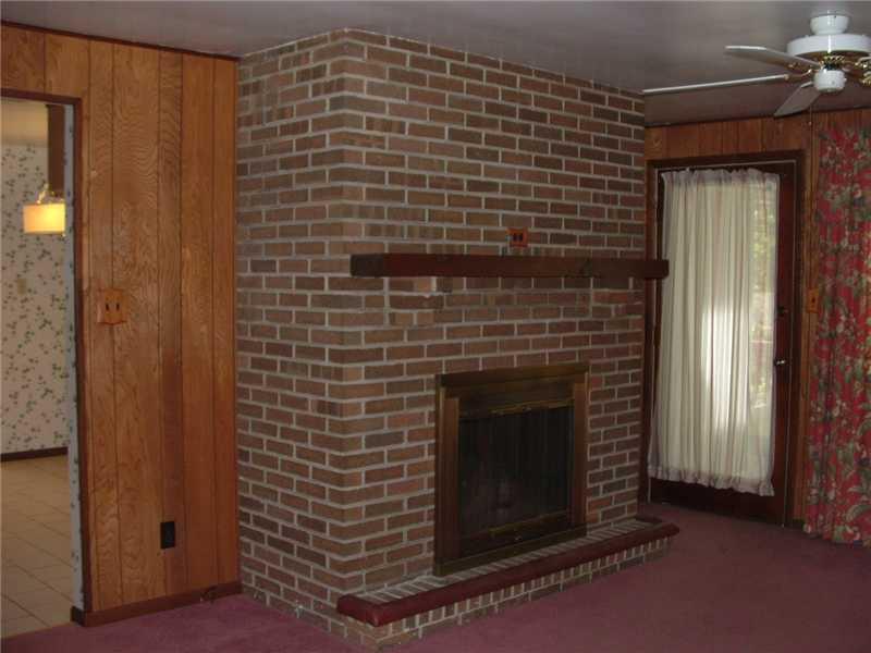 415 Thompson Run Road Pittsburgh, PA 15237 - Photo 9 of 16 Family Room. First floor family room has a log burning firepolace which was converted to gas logs.
