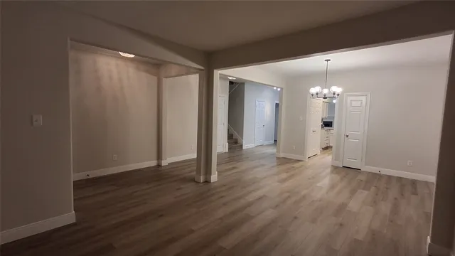 a view of a livingroom with wooden floor