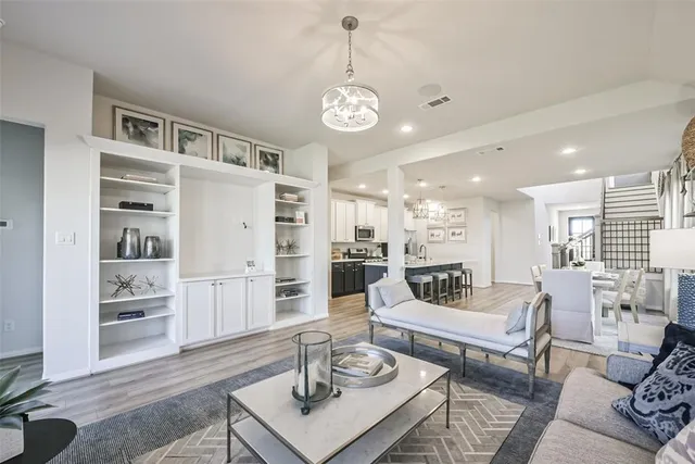 a living room with furniture and a table