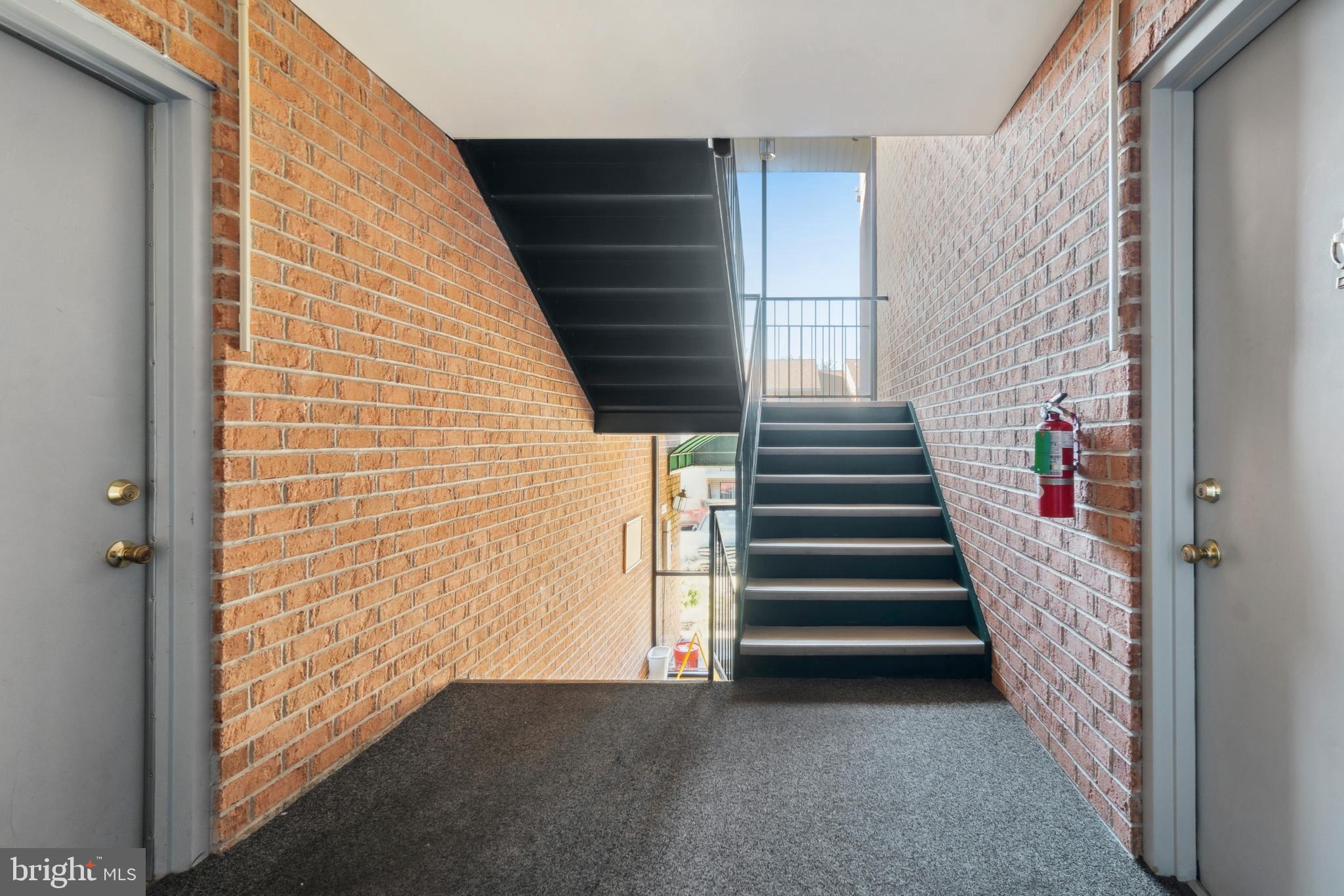1003 Spring Gate Road, Unit 2B Catonsville, MD 21228 - Photo 6 of 27 view from condo facing down the stairs