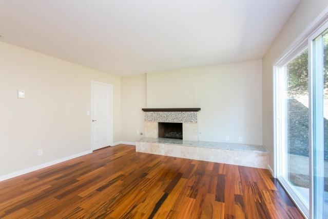 2480 Windmill View Road El Cajon, CA 92020 - Photo 9 of 22 With newly tiled gas fireplace
