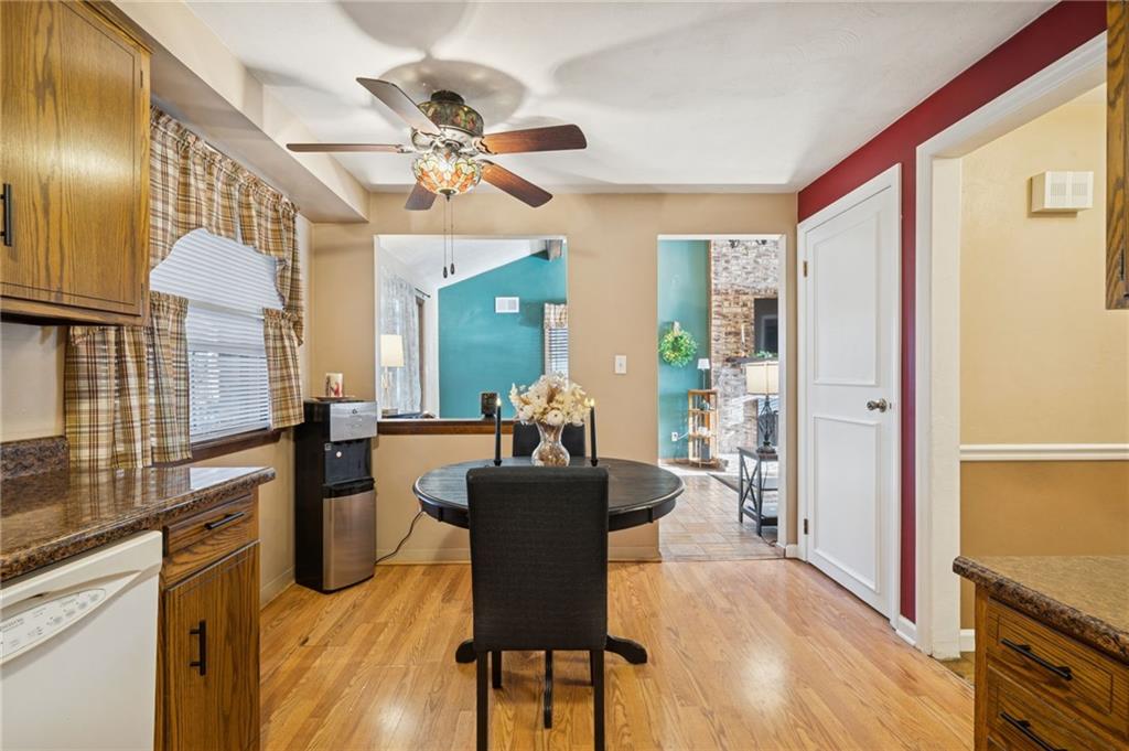 603 Forbes Trail Road Greensburg, PA 15601 - Photo 26 of 38 a view of a dining room with furniture a chandelier and wooden floor