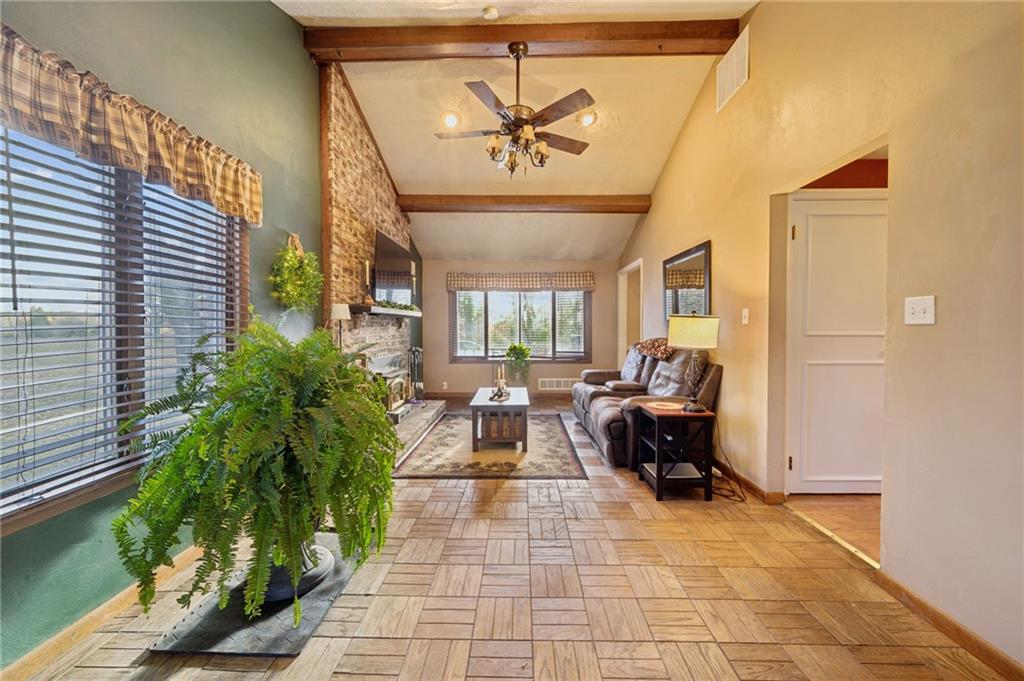 603 Forbes Trail Road Greensburg, PA 15601 - Photo 27 of 38 a living room with patio furniture and a potted plant