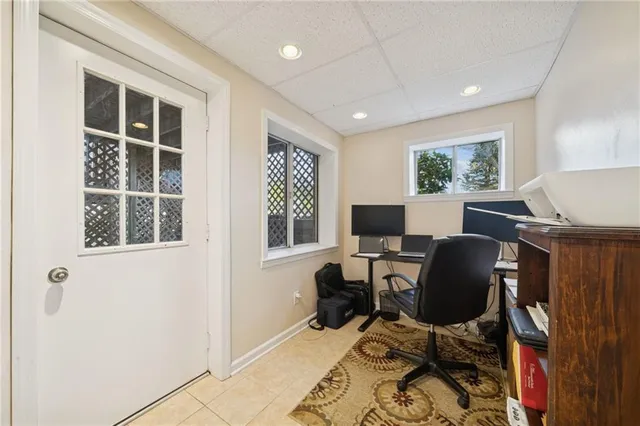 a workspace with furniture and a window