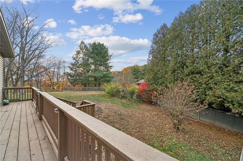 603 Forbes Trail Road Greensburg, PA 15601 - Photo 8 of 38 a view of a wooden deck with trees