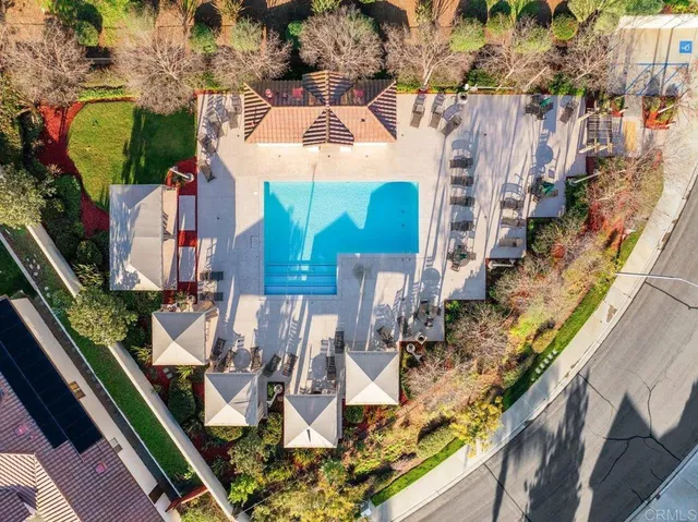 a view of swimming pool with outdoor seating