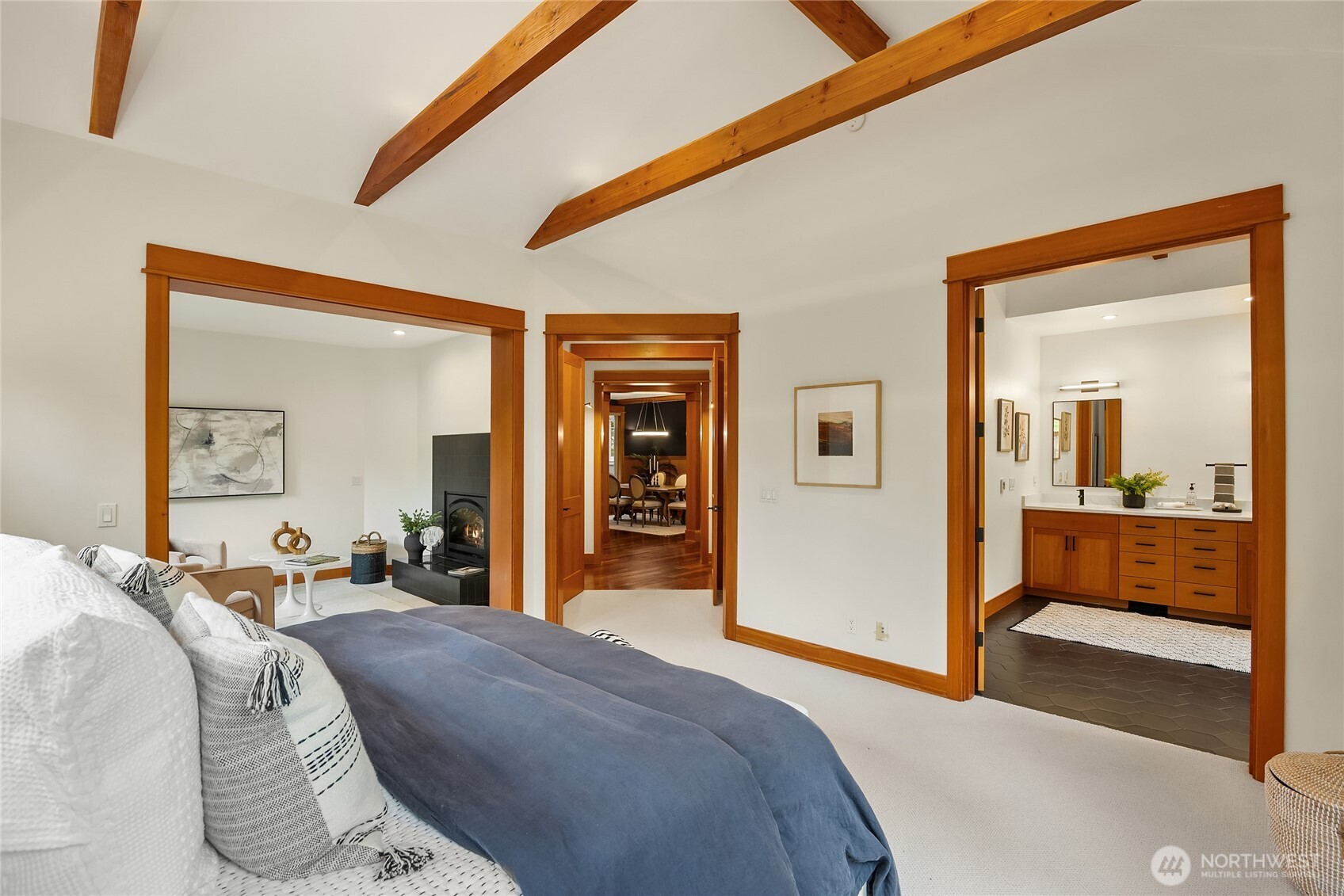 6477 Haley Loop Road Northeast Bainbridge Island, WA 98110 - Photo 22 of 40 a bedroom with a bed and a large mirror