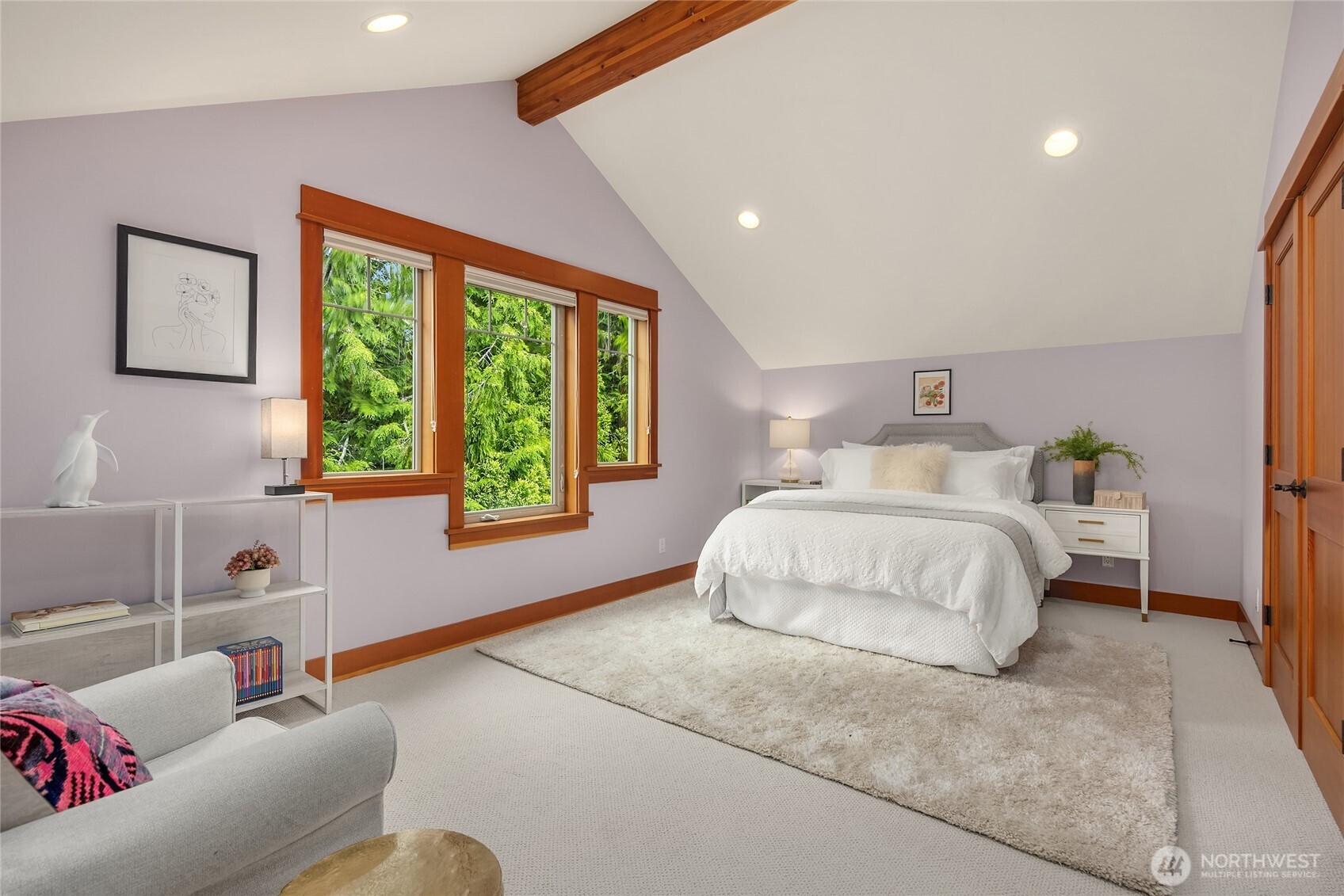 6477 Haley Loop Road Northeast Bainbridge Island, WA 98110 - Photo 29 of 40 a bedroom with a bed and a couch